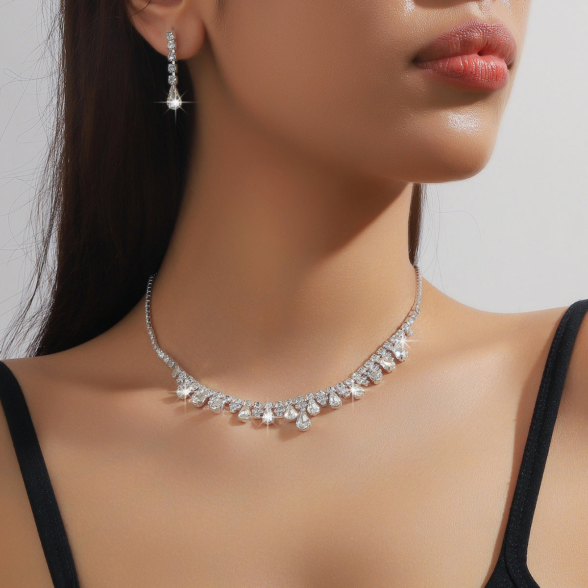 Elegance Sparkle - Diamanten Ketting en Oorbellen Set